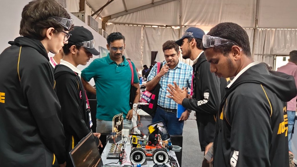Team VoltEdge presenting EdgeBot to evaluators in the competition pit